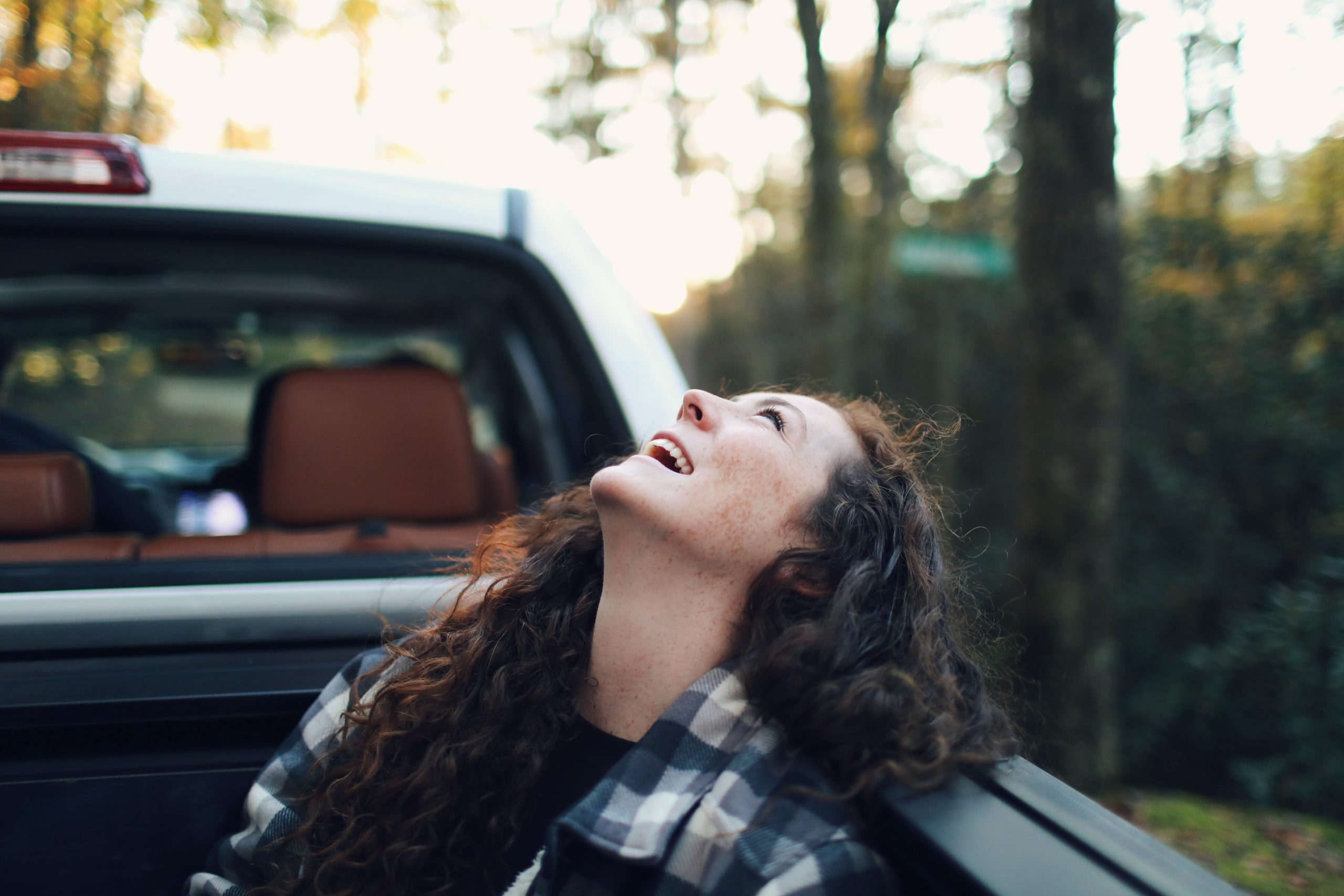 laughing girl in truck